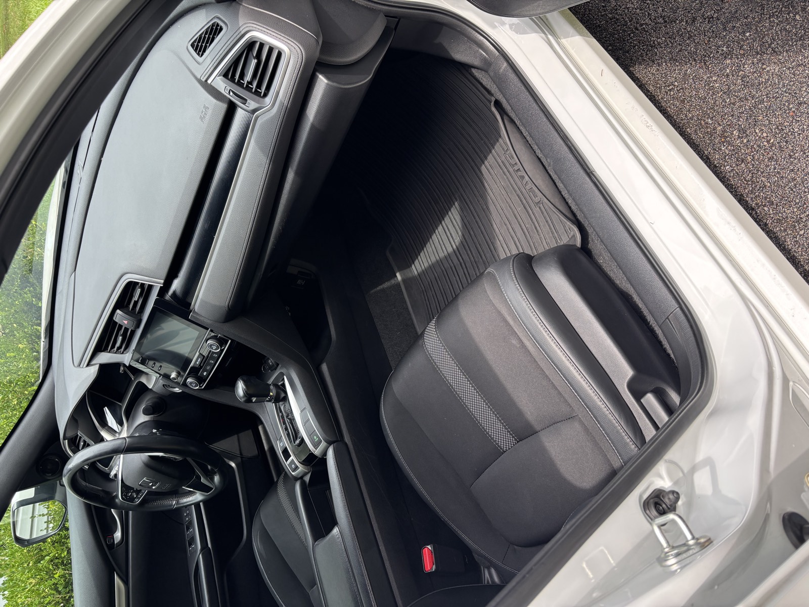 Dashboard and front cabin detailed to like-new condition