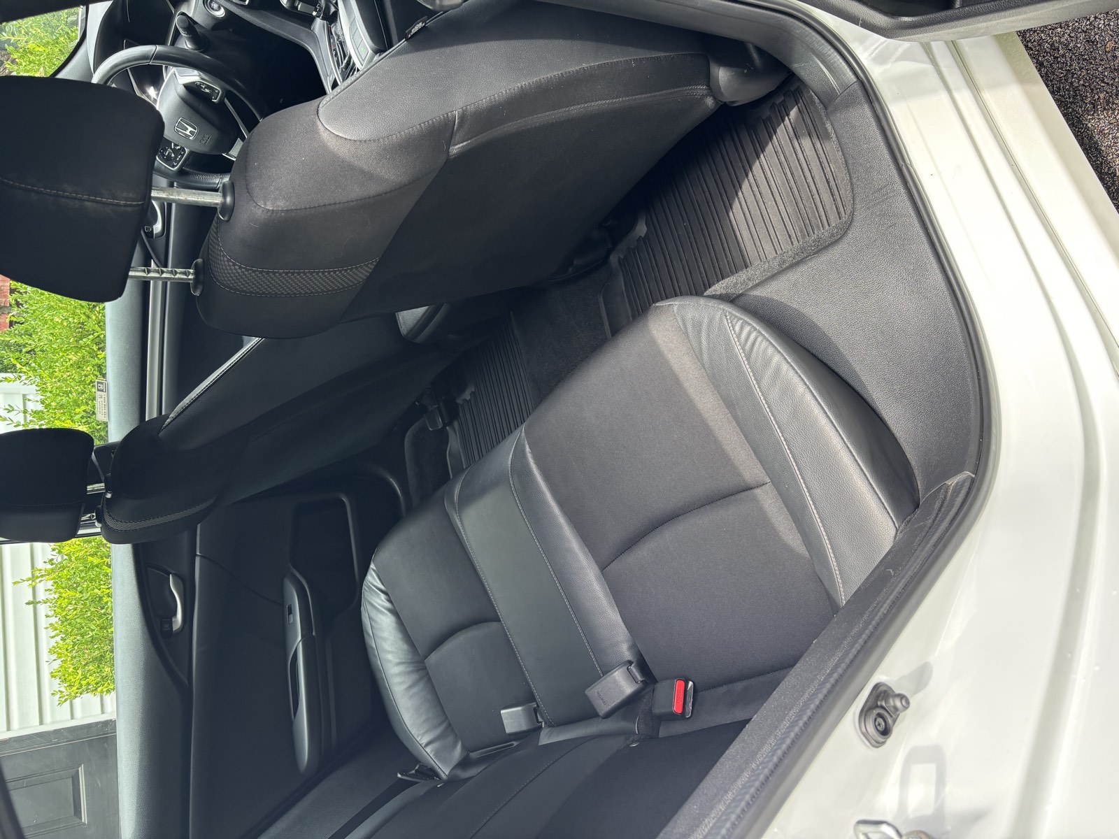 Spotless rear seats and carpet after a deep interior clean