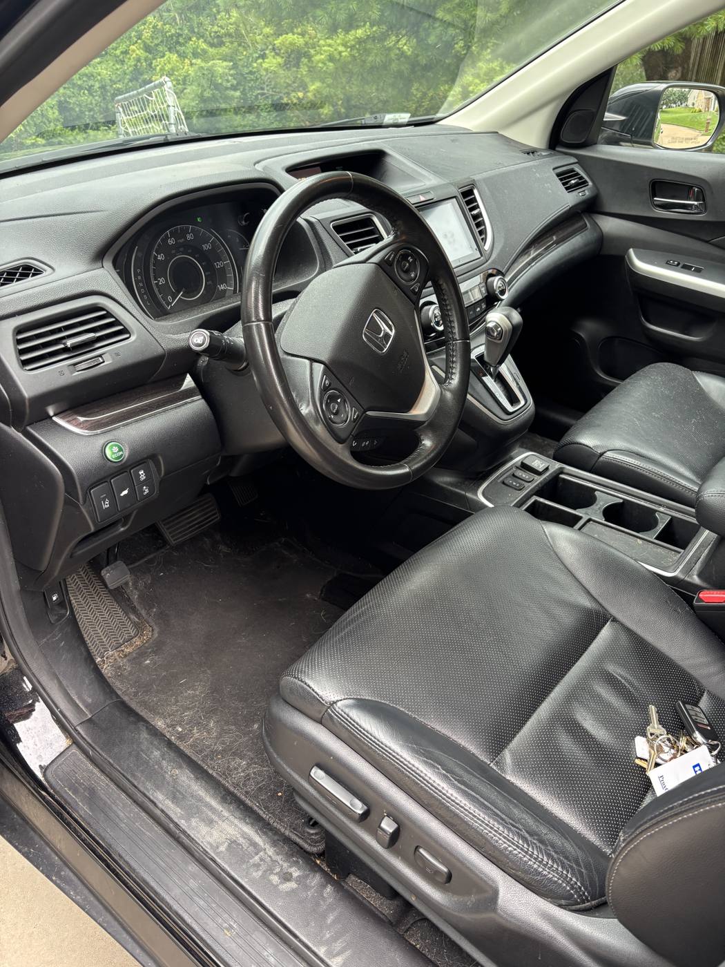 Driver seat and floor dirty before detailing