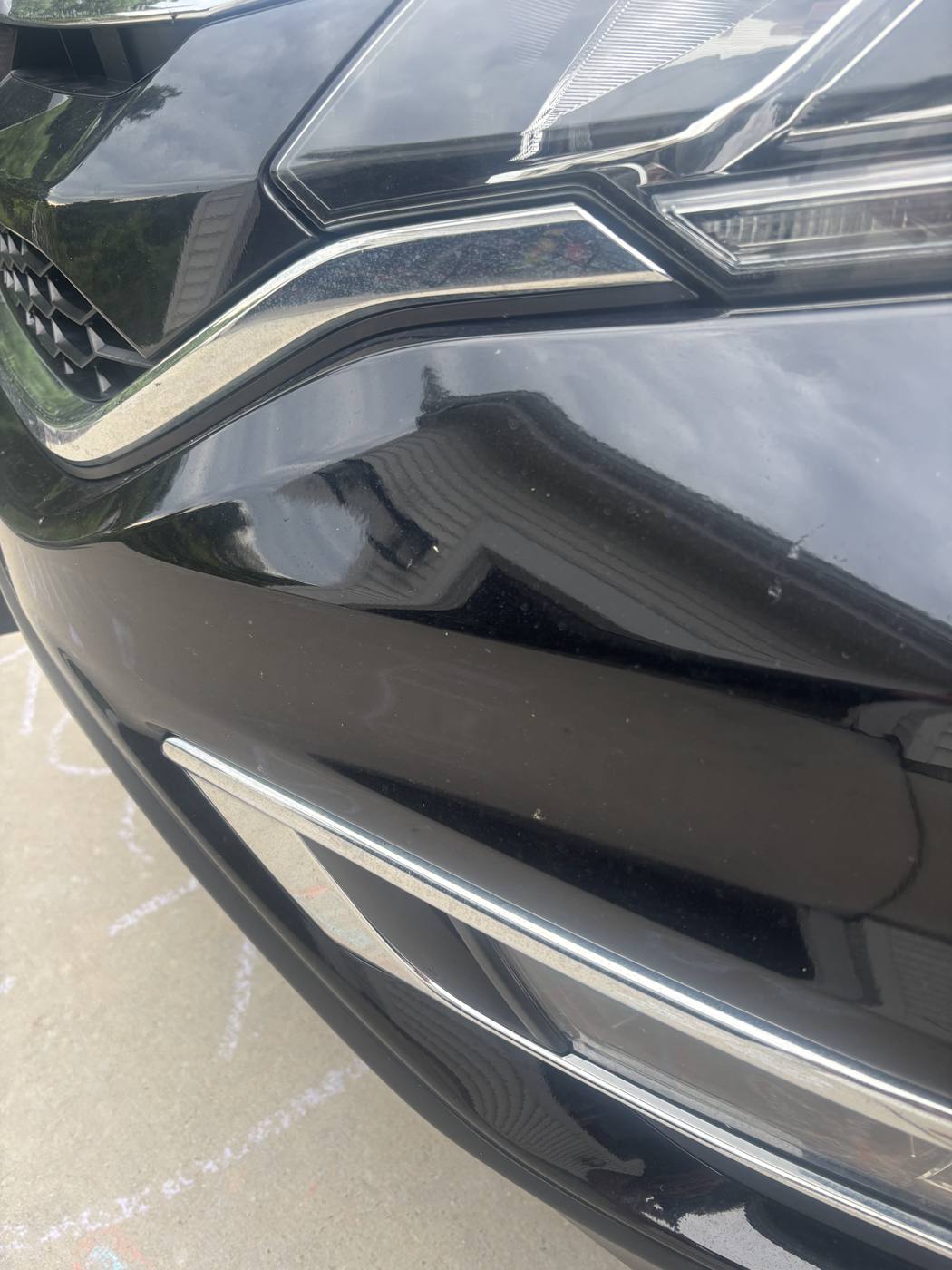 Dusty front bumper and grille before detailing