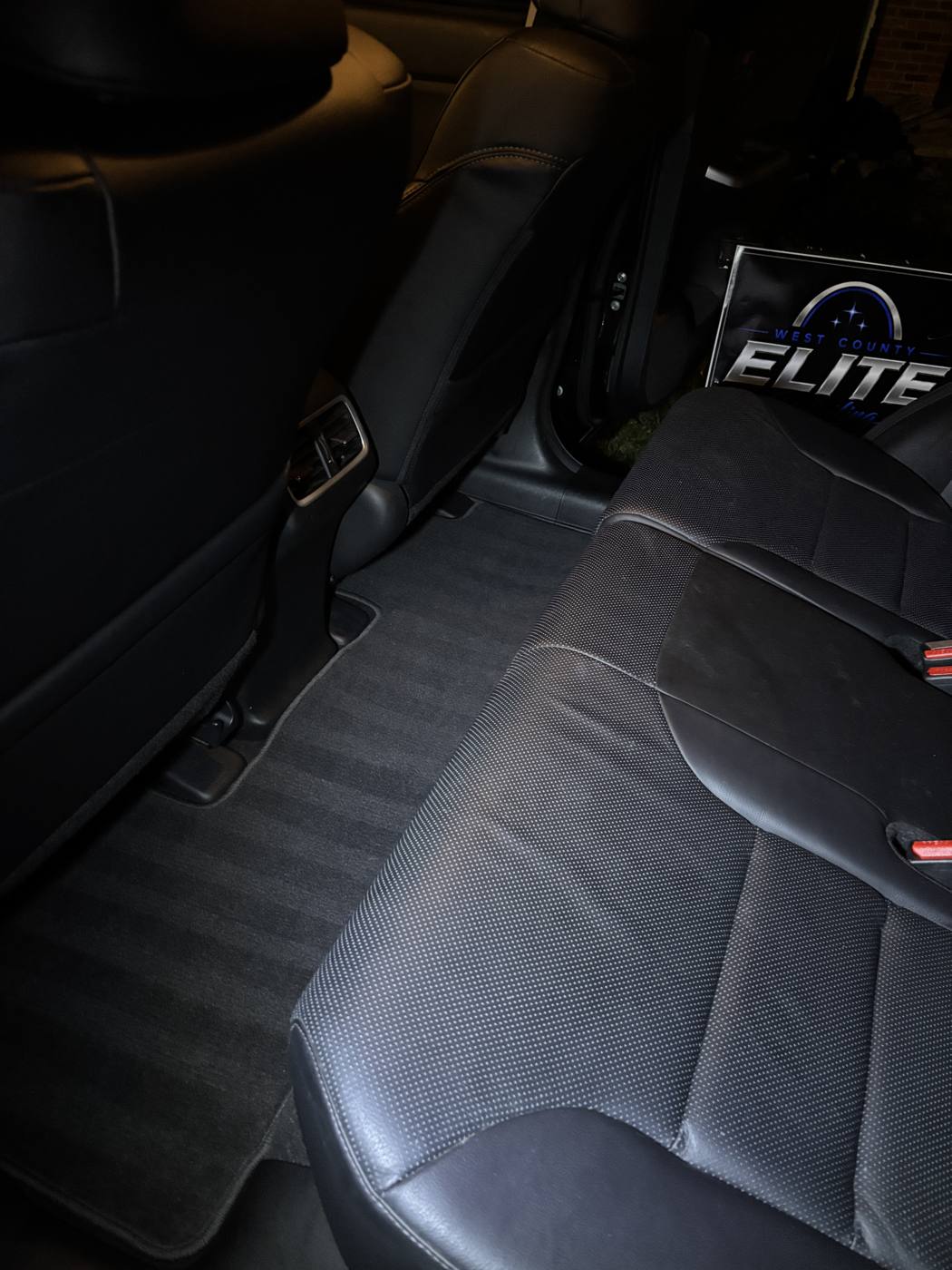 Rear seat and carpet cleaned after detailing