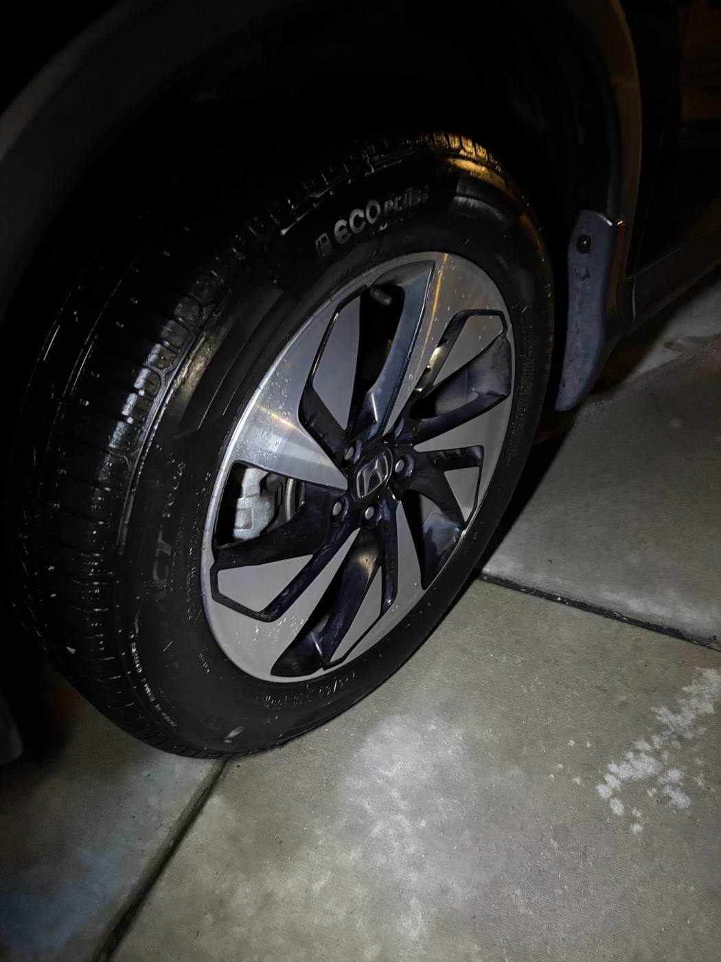 Cleaned wheel and dressed glossy tire after detailing