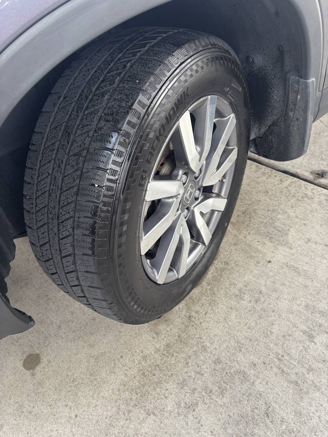 Honda Pilot wheel and dressed tire after detailing