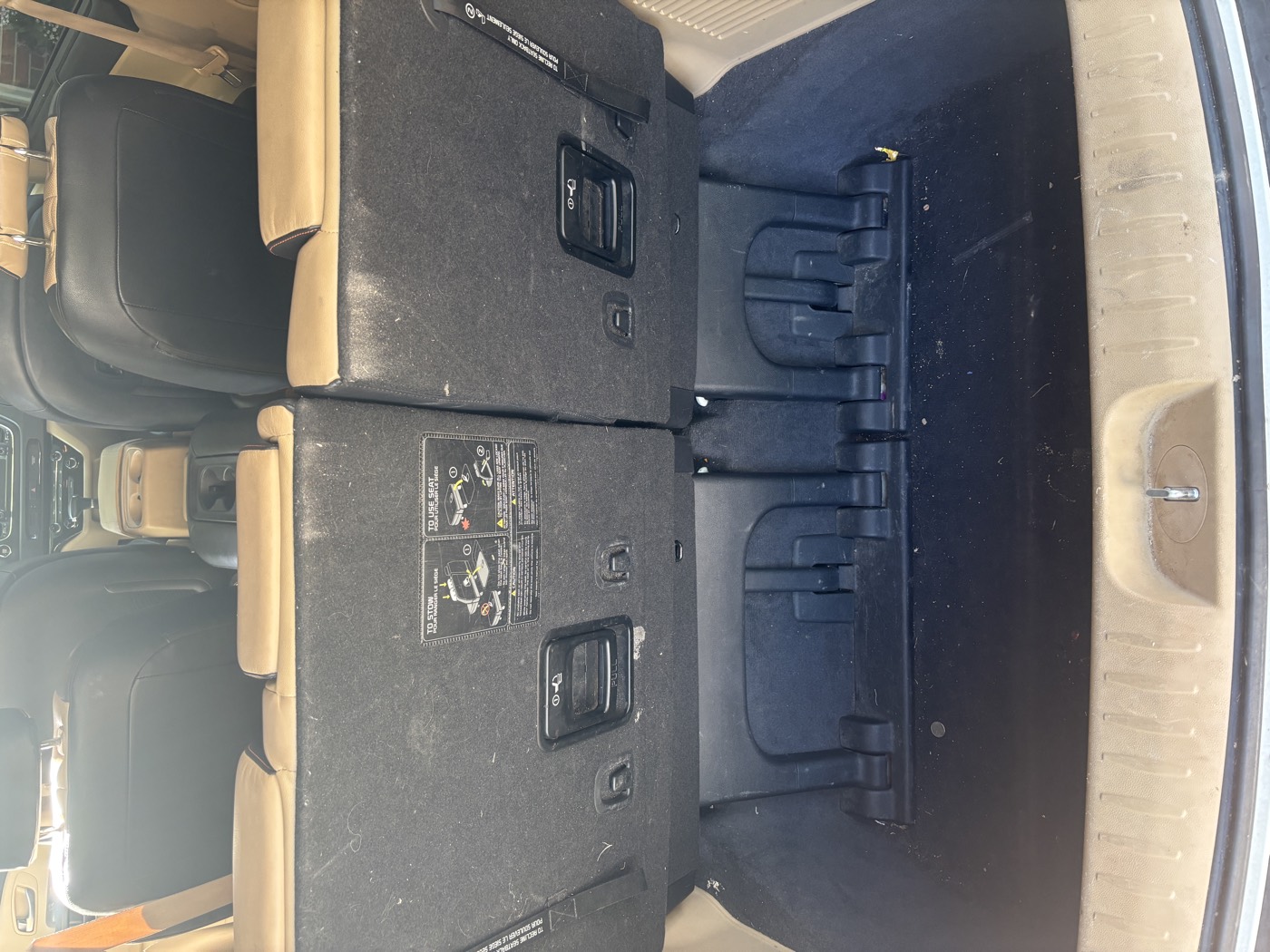 Dusty trunk and cargo area before detailing