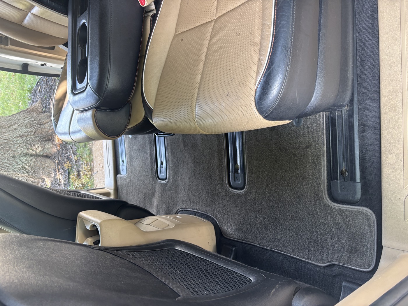 Second row carpet freshly vacuumed and shampooed after detailing