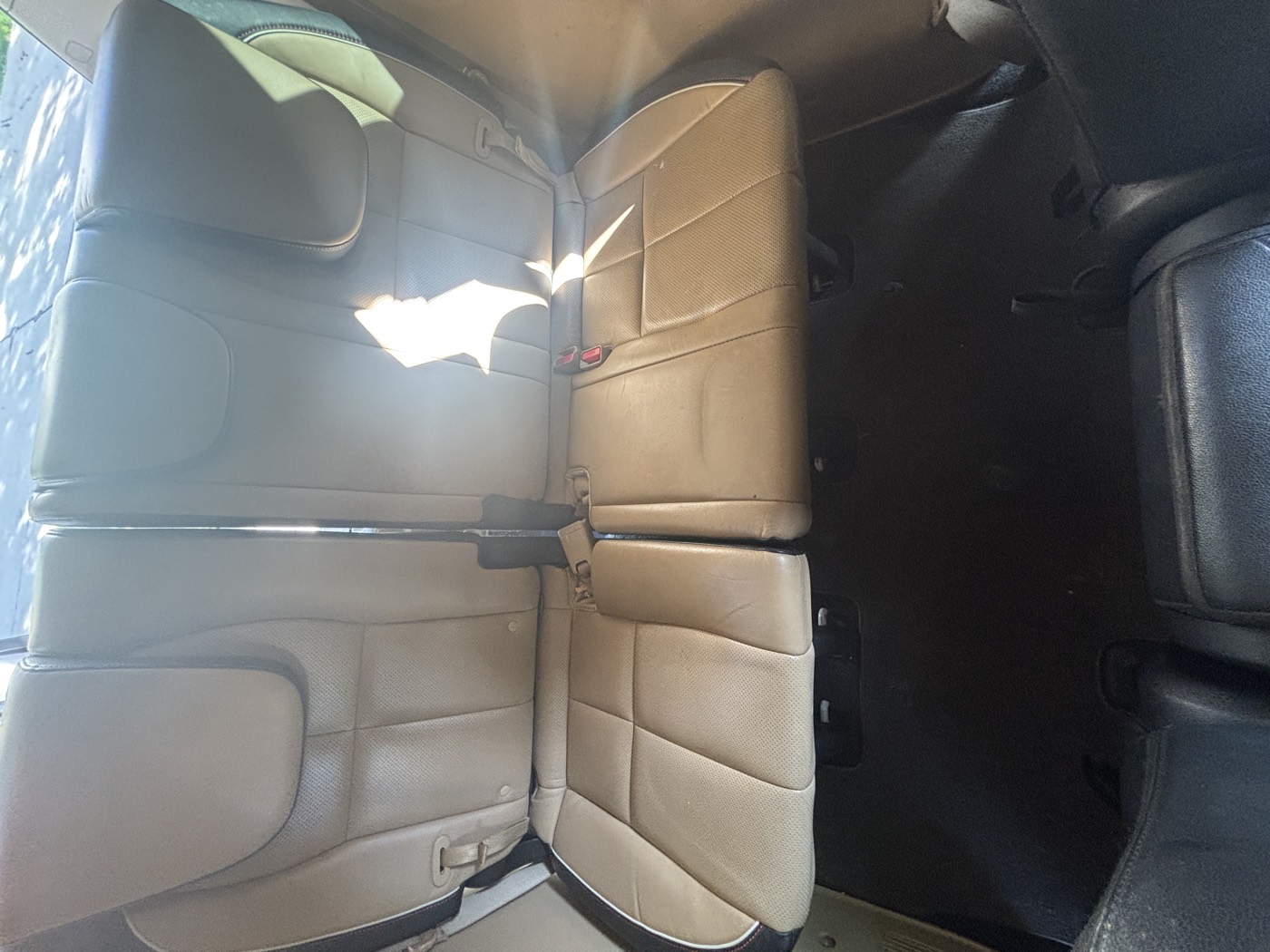 Third row leather seats soiled before detailing